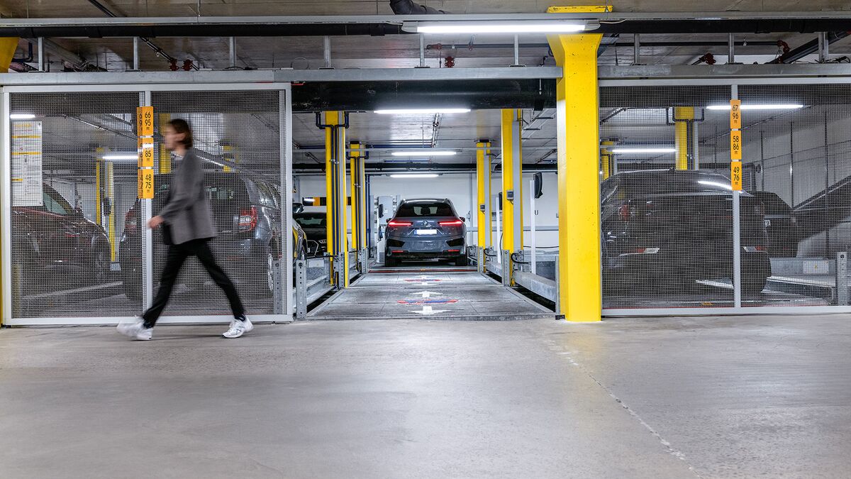 Front view of the parking system, showing a car parked in a parking space
