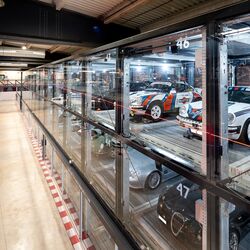 An oblique view of the car park at Motorworld in Mallorca, showing the cars